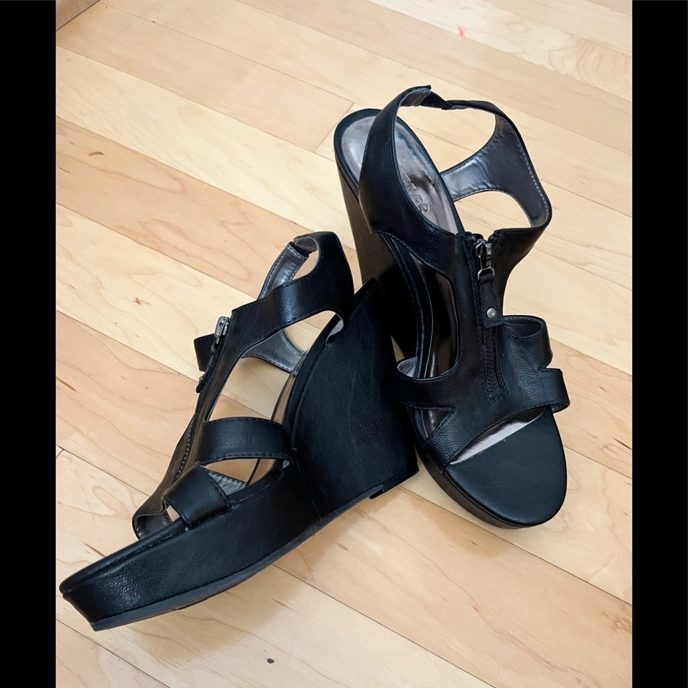 Carlos  black 5” wedge leather platforms with zipper detail. Size 9.